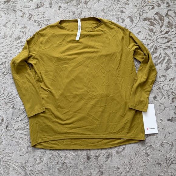 Lululemon Athletica back in action  Nulu Long Sleeve Top 10 NEW - Picture 11 of 11
